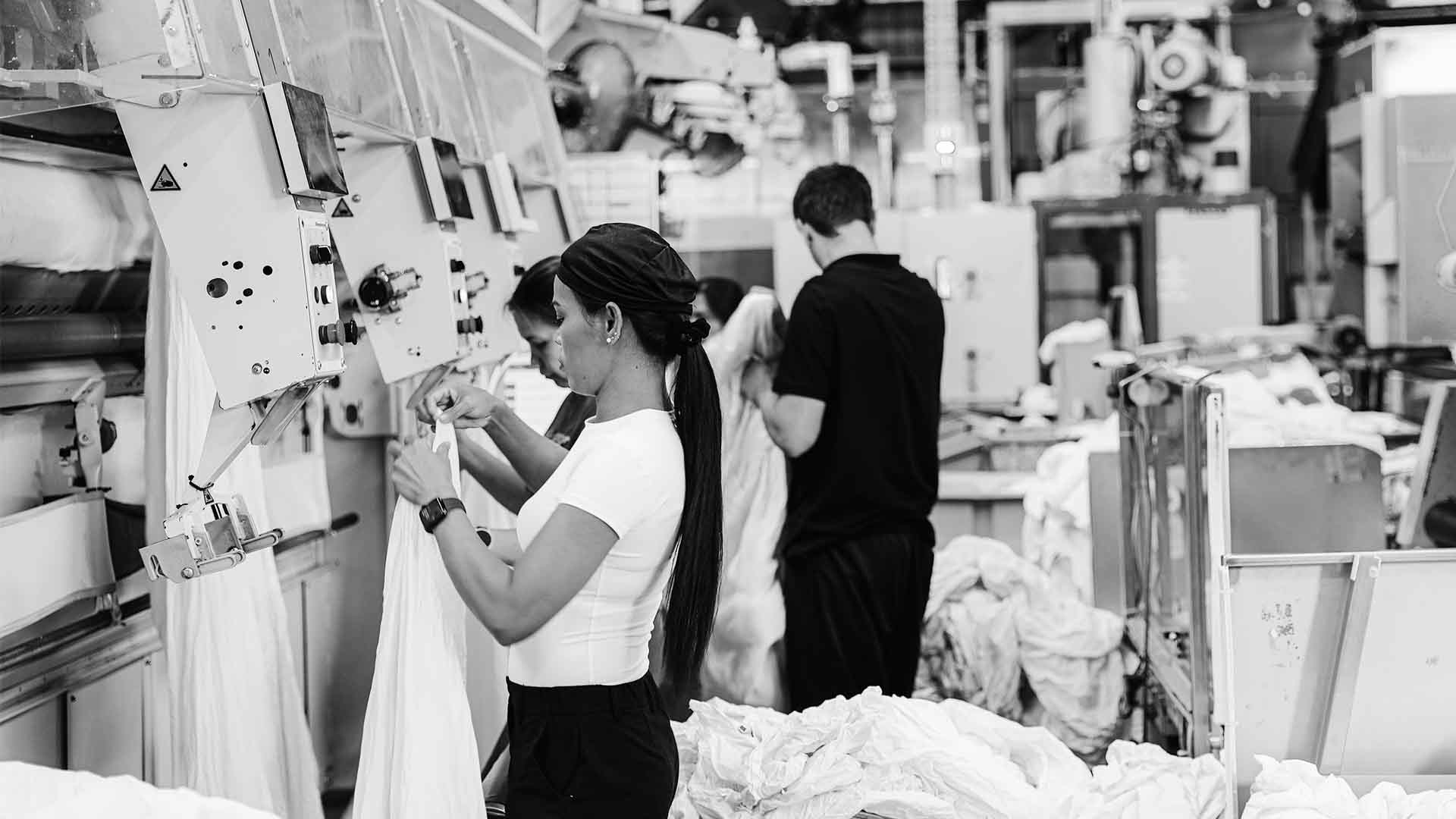 Super Clean Linen Service - staff at press